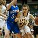 Manchester senior Taylor Manders drives toward the rim in the first half of the game against Saginaw Nouvel on Saturday, March 16. Daniel Brenner I AnnArbor.com